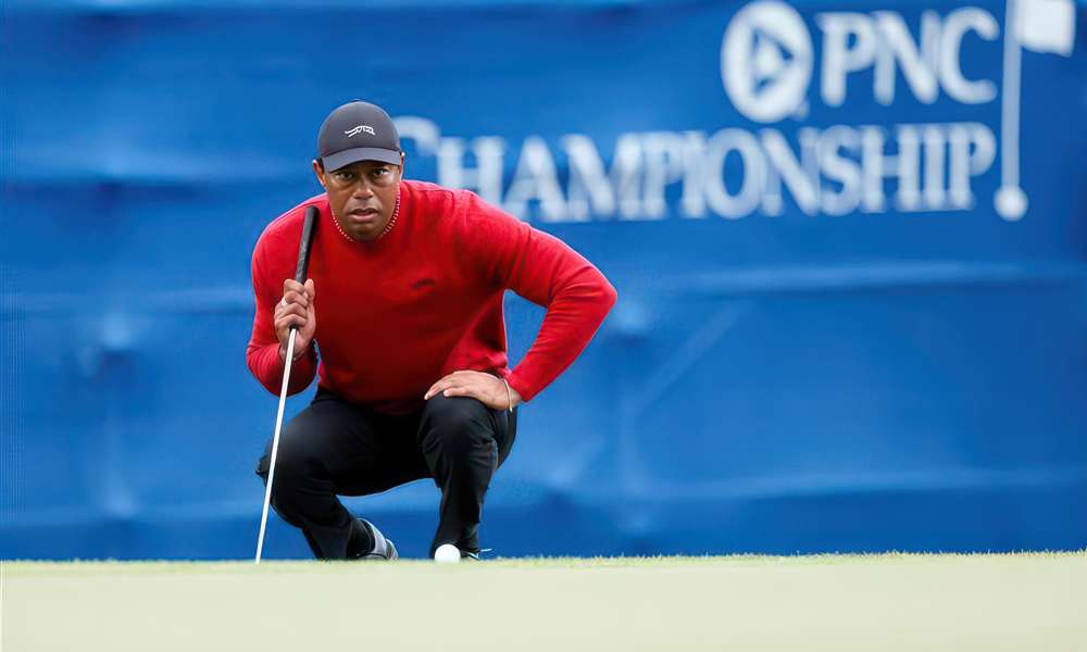 Tiger Woods holding a golf club