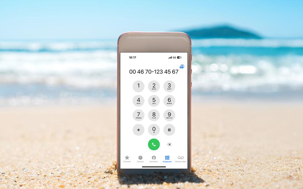 iPhone i sanden på strand utomlands